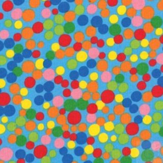 Das Bild zeigt einen blauen Stoff mit vielen bunten Tupfen, die wie Confetti erscheinen.