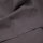 Das Bild zeigt den Stoff  Heavy Washed Canvas in calm Grey. Es ist ein dunkles grau. Dieser Stoff liegt leicht eingefaltet auf einem Tisch.