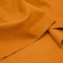 Das Bild zeigt den Heavy Washed Canvasstoff in carrot. Es...