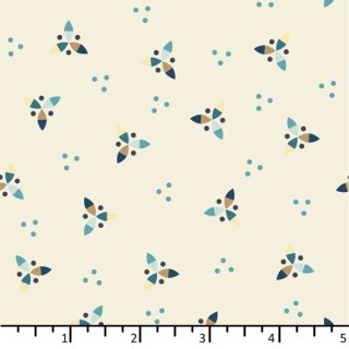 Das Bild zeigt einen naturfarbene Baumwollstoff mit stilisiertem Propellermotiven in beige und dunkelblau, mit kleinen Punkten.
