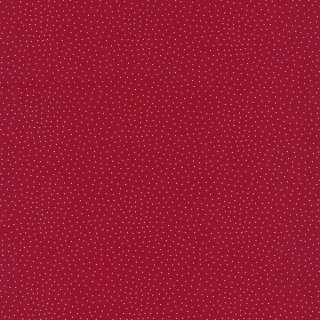 Das Bild zeigt den tiefroten Baumwollstoff mit kleinen weissen unregelmaessigen Tupfen.