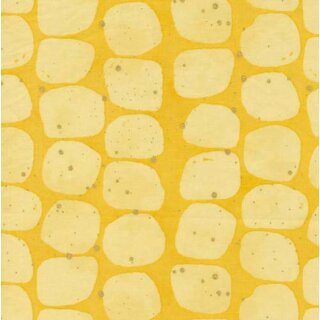 Das Bild zeigt den gelben Baumwollstoff mit einer Art gelben Kieselsteinen und zarten Golddruck Puenktchen.