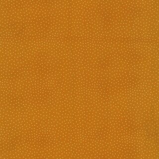 Das Bild zeigt den karamellfarbenen Baumwollstoff mit kleinen weissen unregelmaessigen Tupfen.