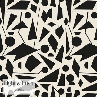 Die Ansicht zeigt einen weich fliessenden schwarz weiss gemusterten Viscosestoff.