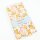 Stoffcoupon, mit TPU beschichtete Baumwolle in natur mit kleinem Blumenmuster in orange, pink, petrolblau, mit Neonakzenten