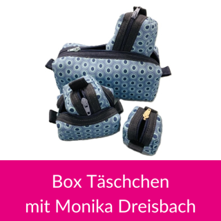 Das Bild zeigt mehrere Monis Boxtaeschchen in blau blauen Punkten.