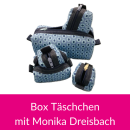 Das Bild zeigt mehrere Monis Boxtaeschchen in blau blauen...
